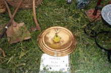 Apple with scissors & donations.  Donations to all the cruces are appreciated.  The scissors in the apple are to remind people that NOT to say "BUT".  You can say, "How pretty!"  You can't say, "How pretty, but..."