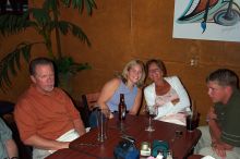 John contemplating a thorny family matter while Suzy, Georgia, and John Jr. wait for the enlightening words.